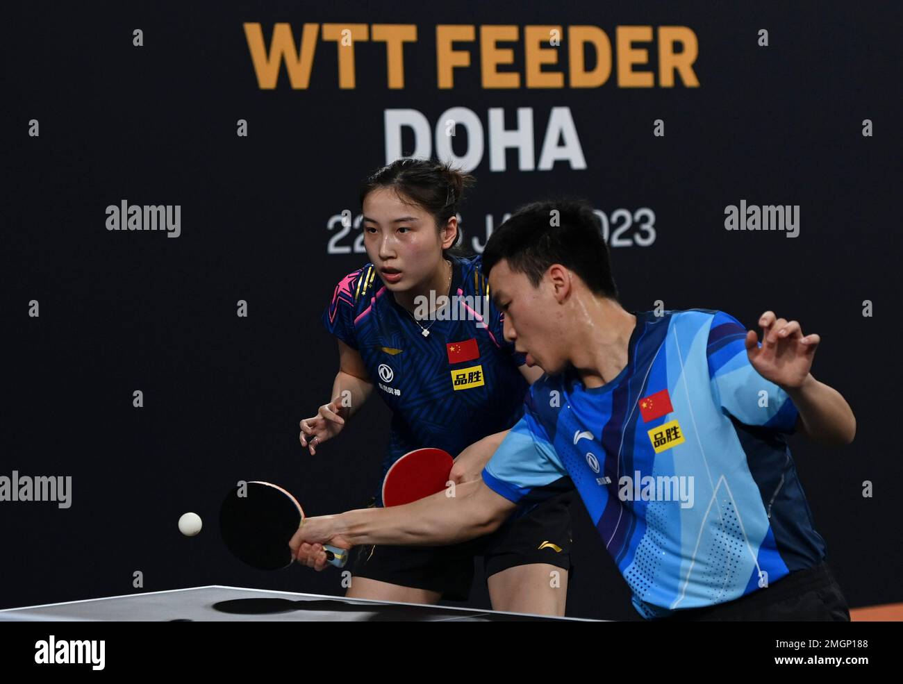 Doha, Qatar. 26th Jan, 2023. Qian Tianyi/Xiang Peng (R) of China compete during the mixed doubles final match against their compatriots Kuai Man/Lin Shidong at WTT Feeder Doha 2023 in Doha, Qatar, Jan. 26, 2023. Credit: Nikku/Xinhua/Alamy Live News Stock Photo