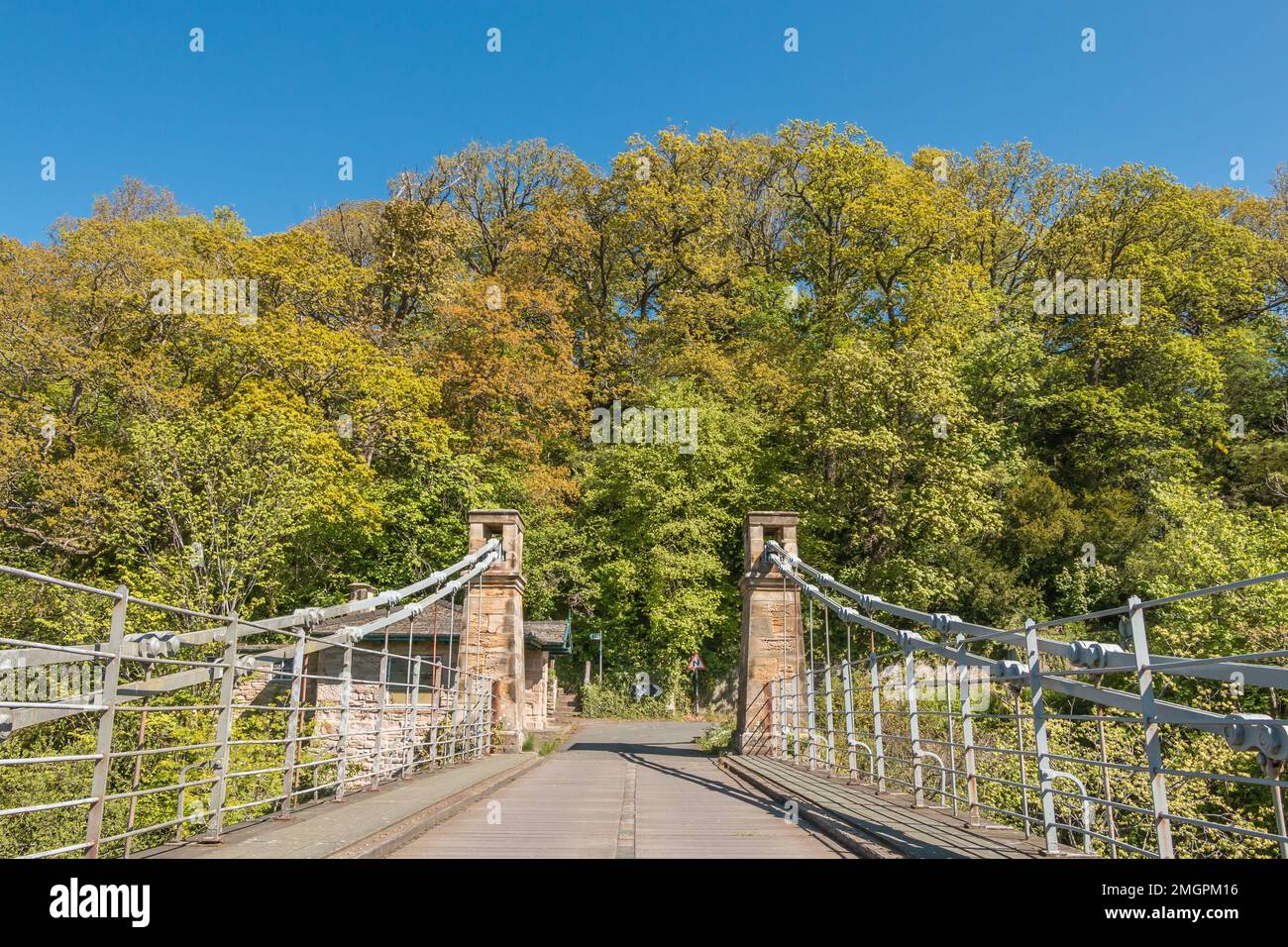 The Grade II* listed and scheduled ancient monument of Whorlton Suspension bridge over the River Tees, County Durham, UK Stock Photo