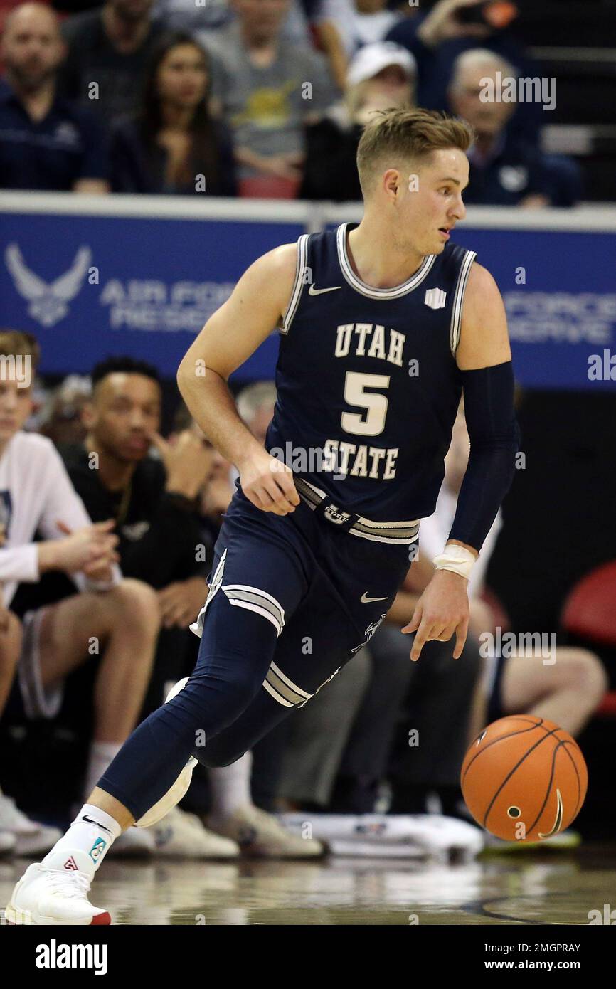 Utah State's Sam Merrill plays against San Diego State during an NCAA