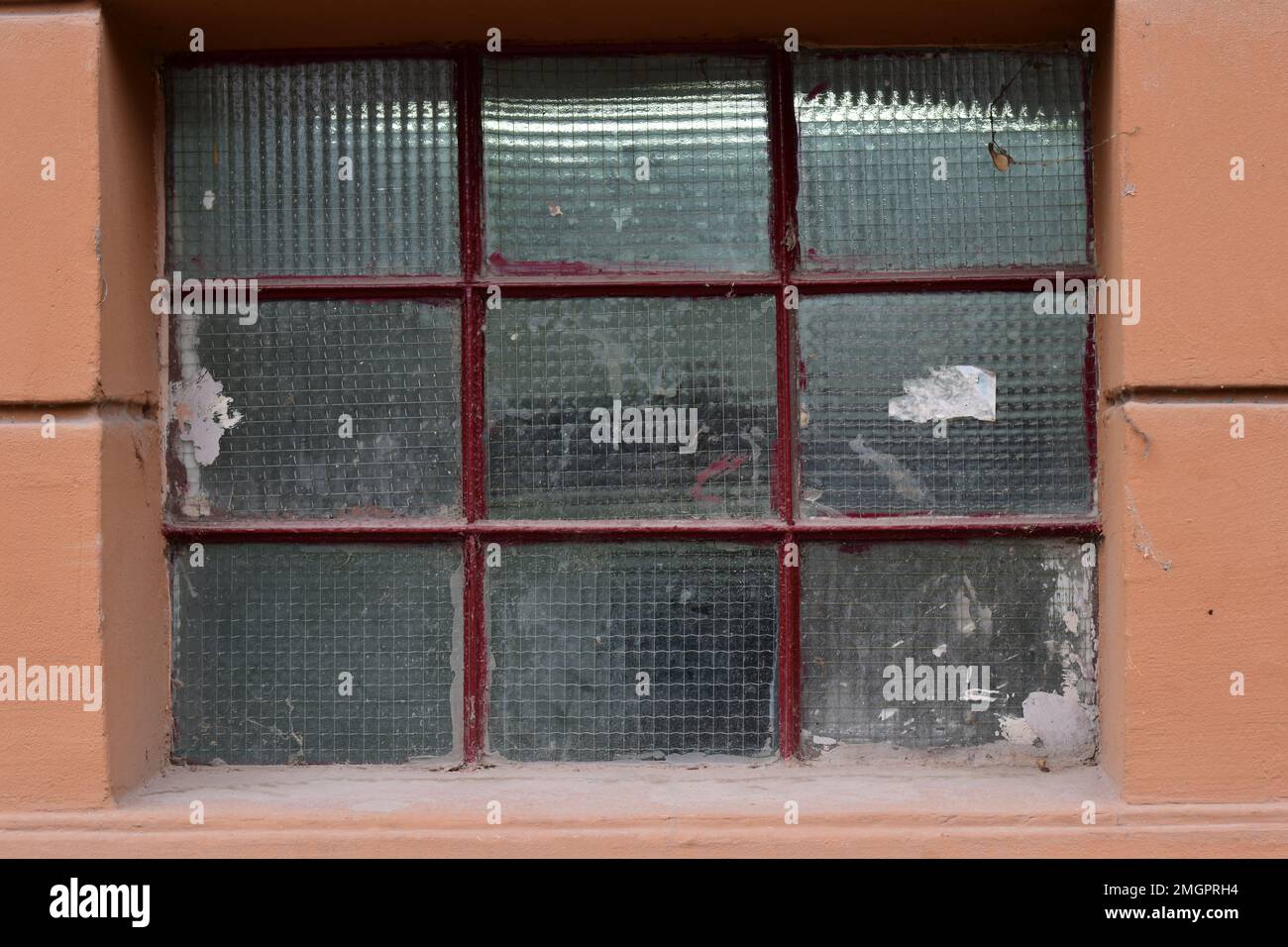 Old window with red bars concept background Stock Photo - Alamy