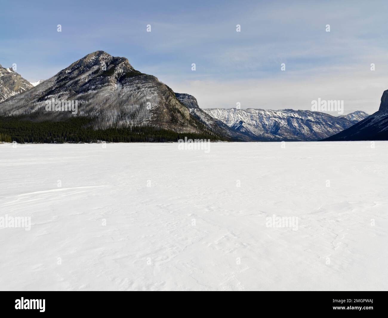 Canada,Alberta,Banff National Park, Lake Minnewanka frozen over in winter Stock Photo