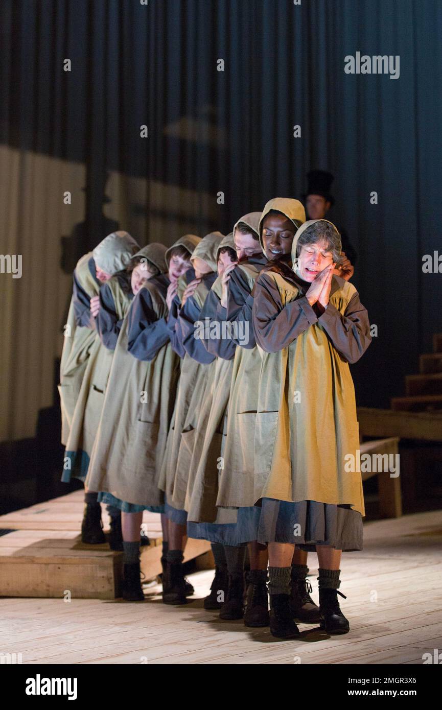 company in JANE EYRE at the Lyttelton Theatre, National Theatre (NT), London SE1  17/09/2015  a co-production with the Bristol Old Vic  based on the novel by Charlotte Bronte   devised by the company   dramaturg: Mike Akers   composer & musical director: Benji Bower   set design: Michael Vale   costumes: Katie Sykes   lighting: Aideen Malone   movement: Dan Canham   director: Sally Cookson Stock Photo