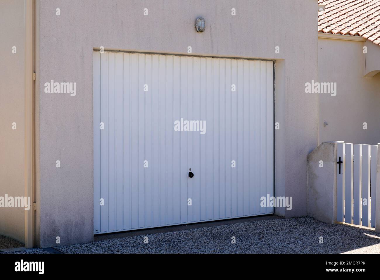 tilting swivel metal garage door gate access to house for a car with