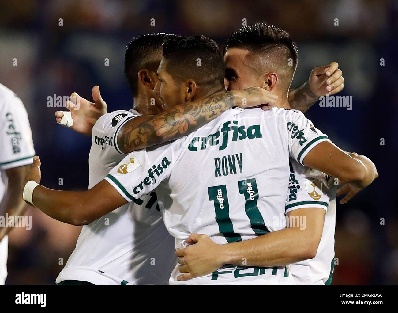 Rony of Brazil's Palmeiras heads the ball in an attempt to score during a  Copa Libertadores round of sixteen first leg soccer match against  Paraguay's Cerro Porteno in Asuncion, Paraguay, Wednesday, June