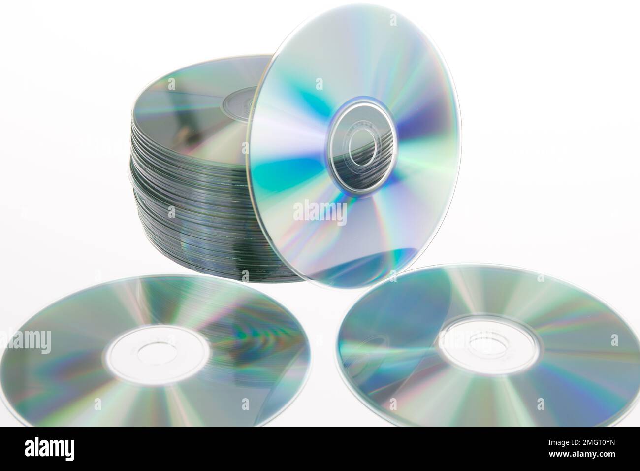 Compact disc stack discs on a white background Stock Photo