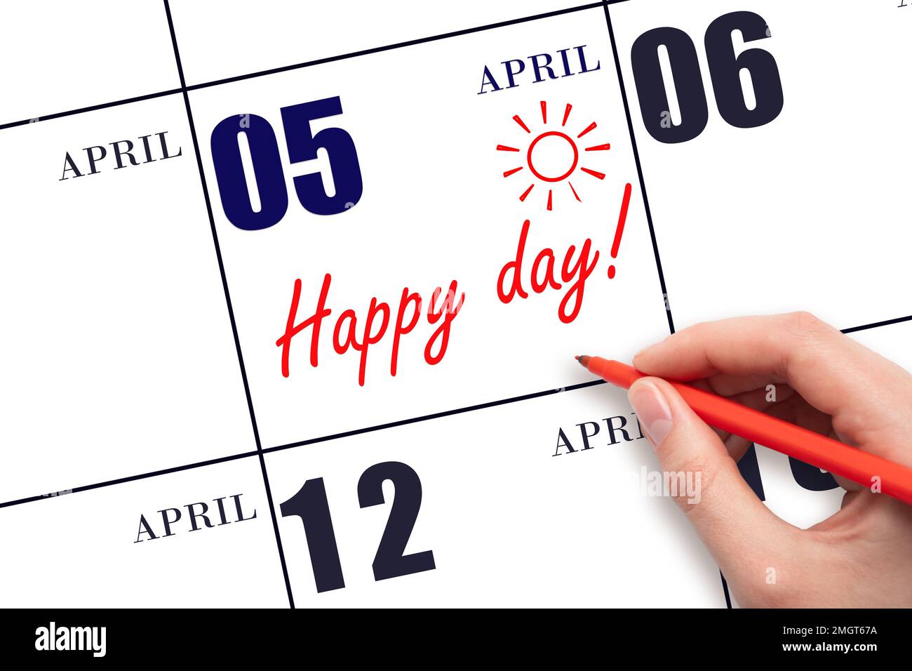 5th day of April.  Hand writing the text HAPPY DAY and drawing the sun on the calendar date April 5. Save the date. Holiday. Motivation. Spring month, Stock Photo