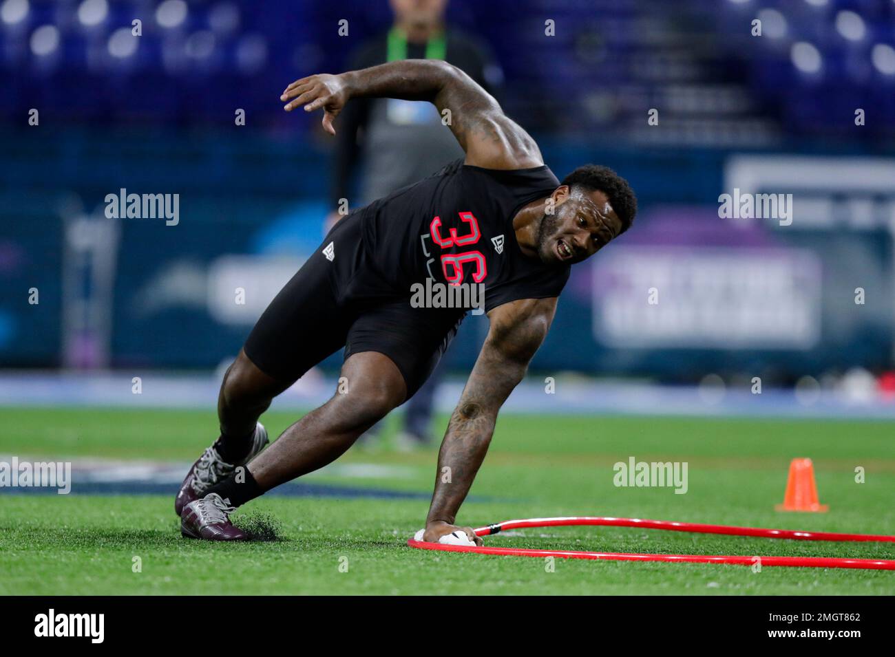 Mississippi State defensive lineman Chauncey Rivers runs a drill at the