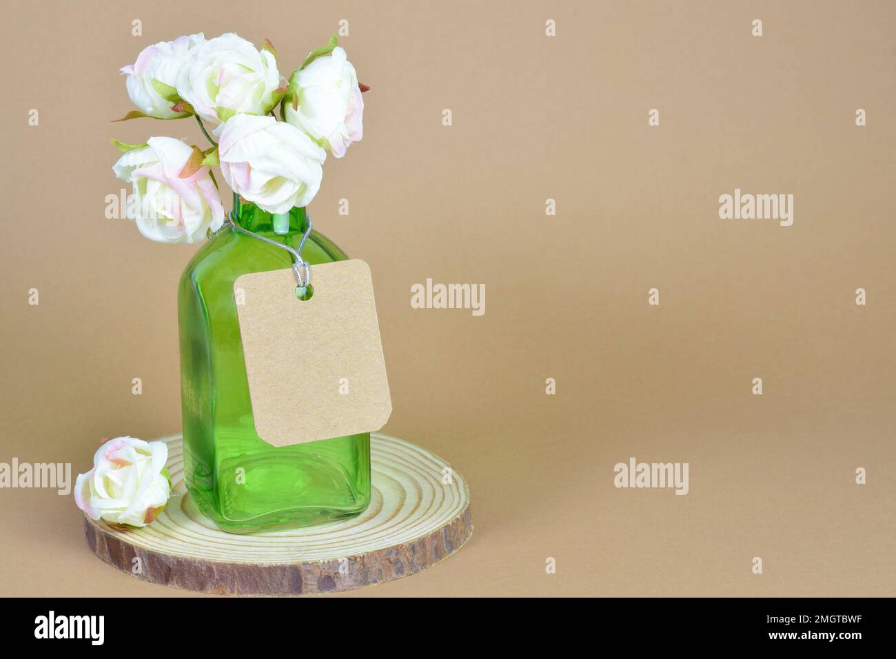 Glass Container With Roses A Glass container with a small bouquet of fabric roses Stock Photo - Alamy