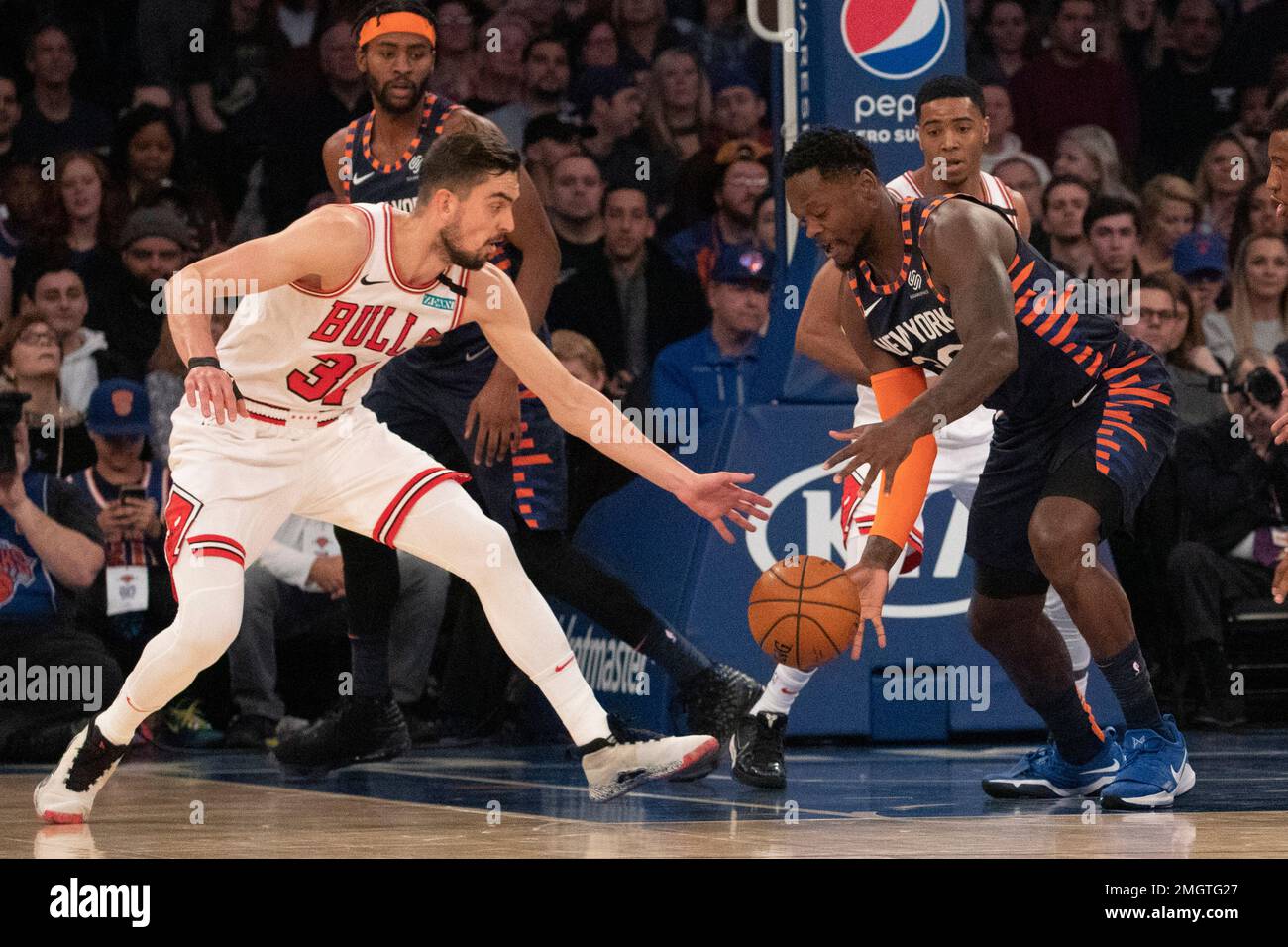 Chicago Bulls guard Tomas Satoransky (31) steals the ball from New York  Knicks forward Julius Randle (30) during the first half of an NBA basketball  game, Saturday, Feb. 29, 2020 in New