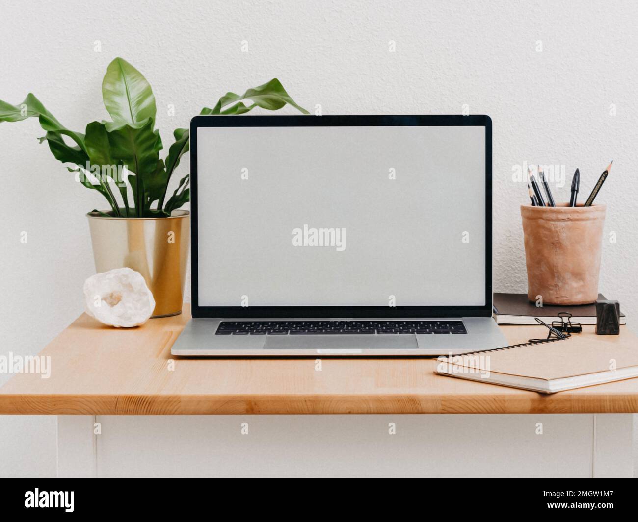 Home office wood desk with open laptop with white blank screen for text. Front  view. Copy space Stock Photo - Alamy, image size:1300x1065