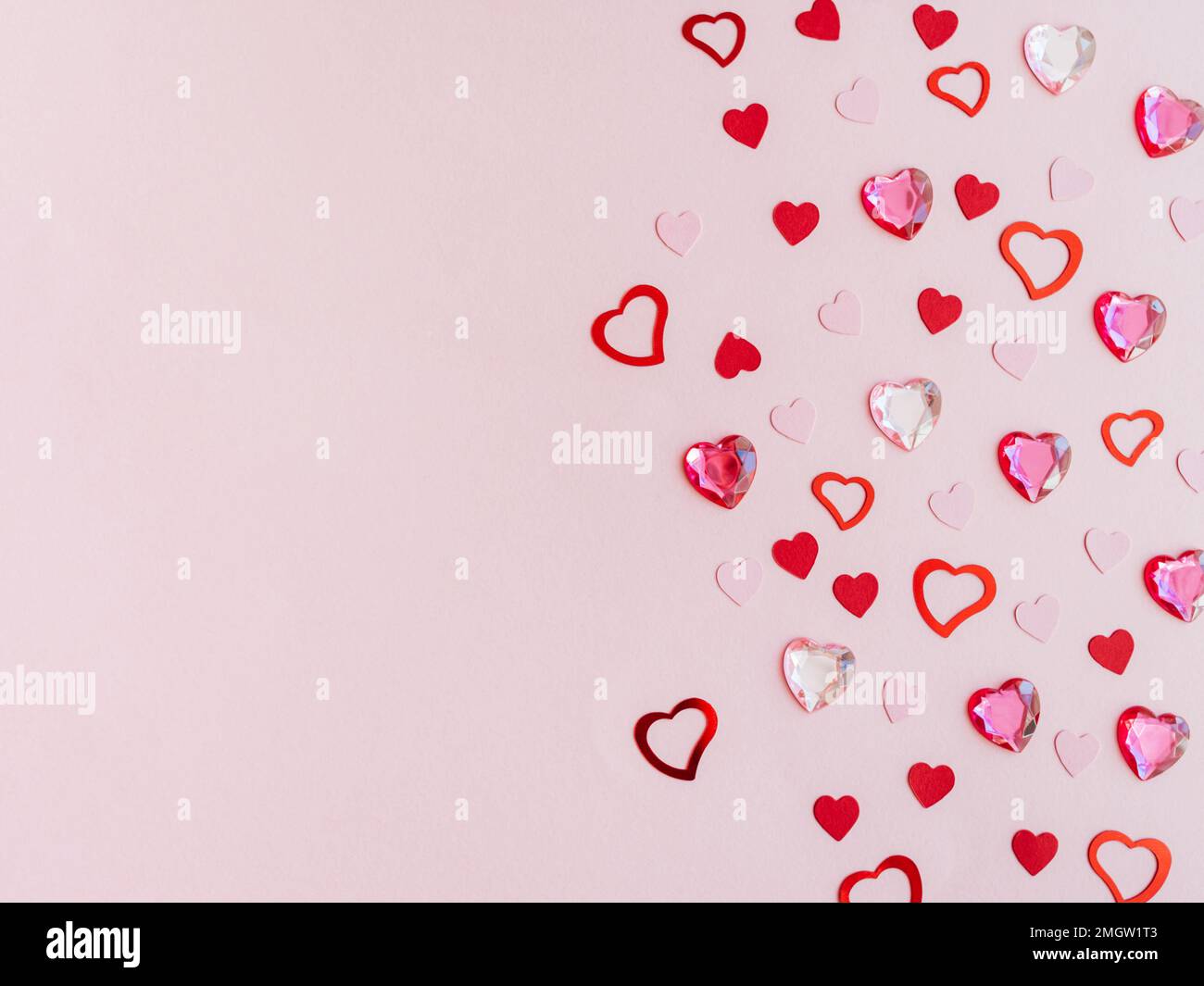 Pink valentines day background with different hearts. Valentine day