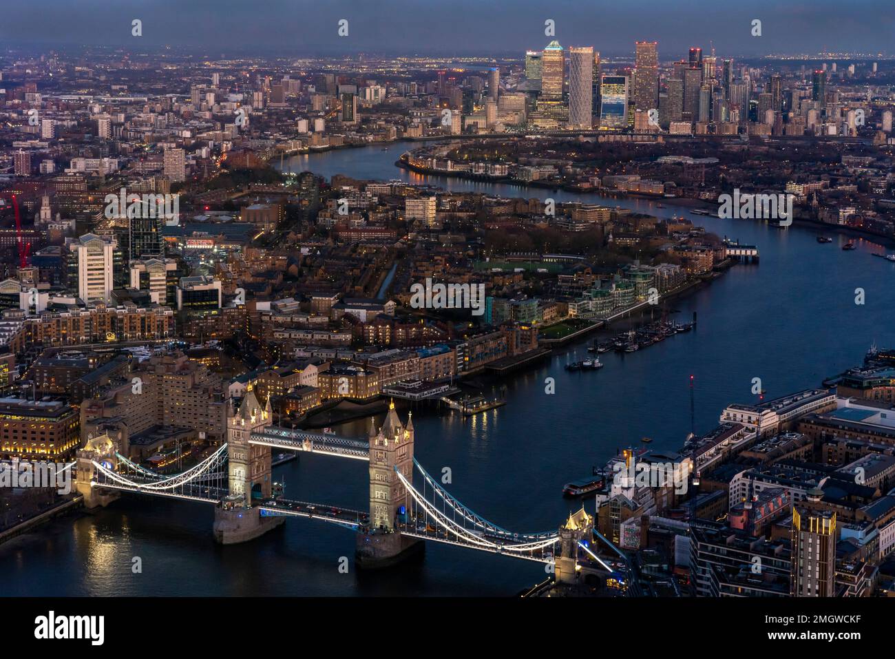 A View Of Tower Bridge, The River Thames and Canary Wharf at Night from The Shard, London, UK. Stock Photo