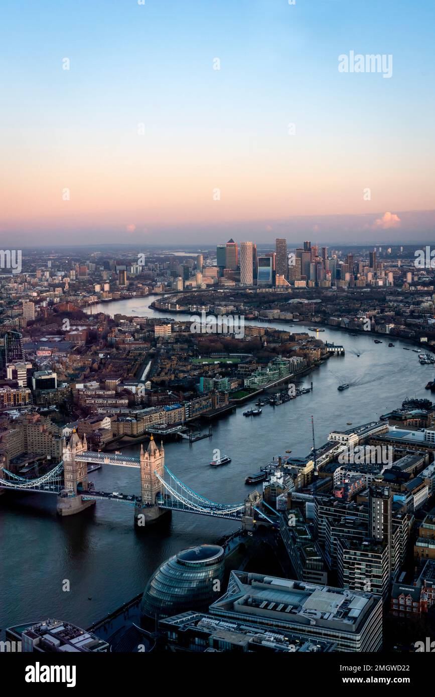 A View Of Tower Bridge, The River Thames and Canary Wharf at Sunset ...