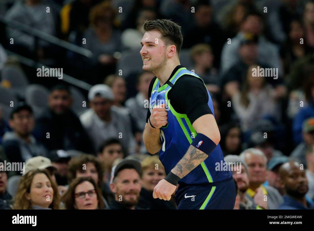 Dallas Mavericks guard Luka Doncic (77) reacts to a play during the ...
