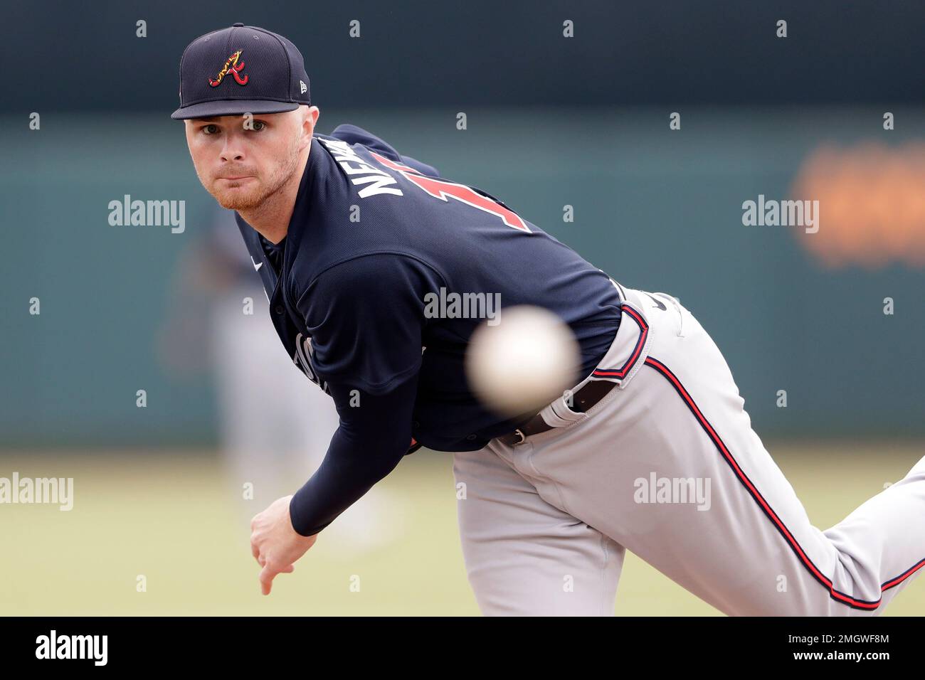 Atlanta Braves pitcher Sean (15) takes his warm up throws