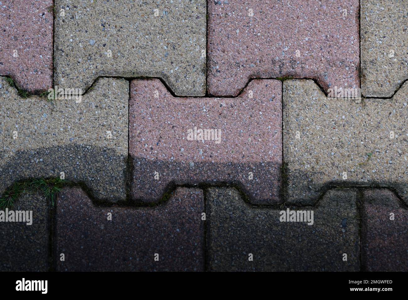 Contrast between auto block slab paving slabs floor dirty clean pressured washed concrete before