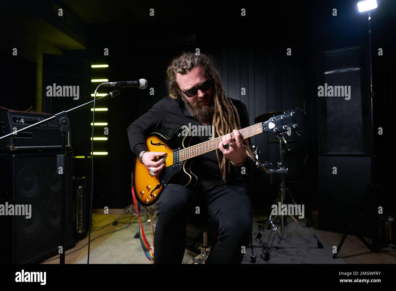 Rock musician plays guitar close hi-res stock photography and images ...