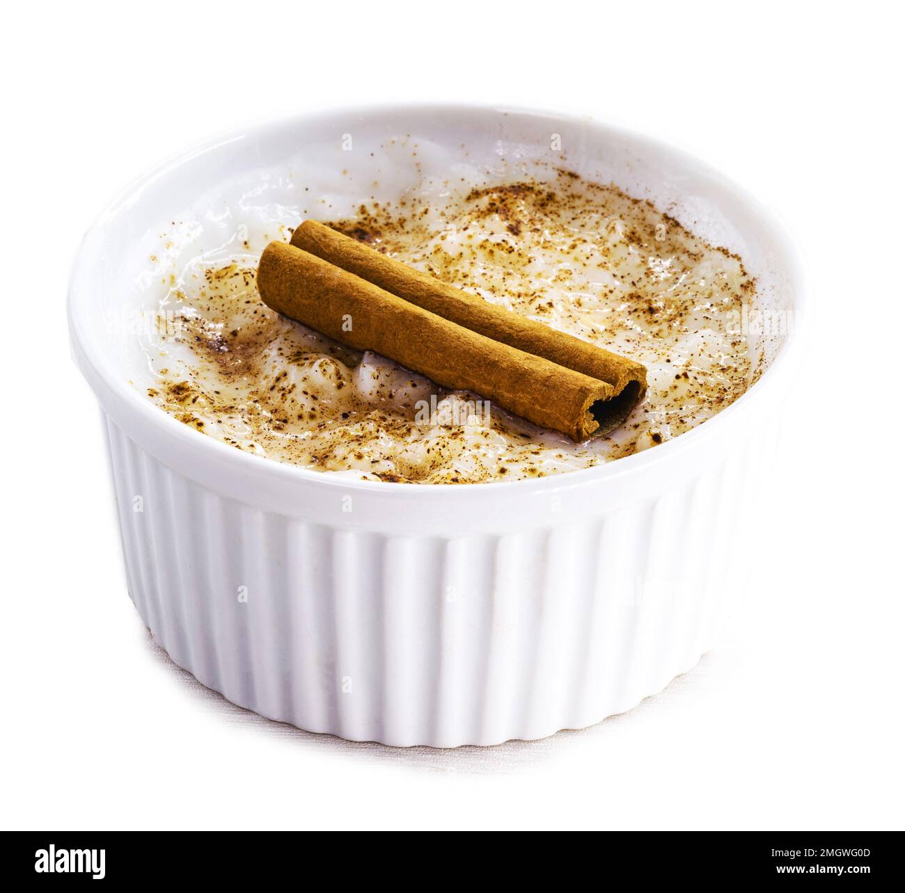 Creamy rice pudding dessert sprinkled and decorated with cinnamon ...