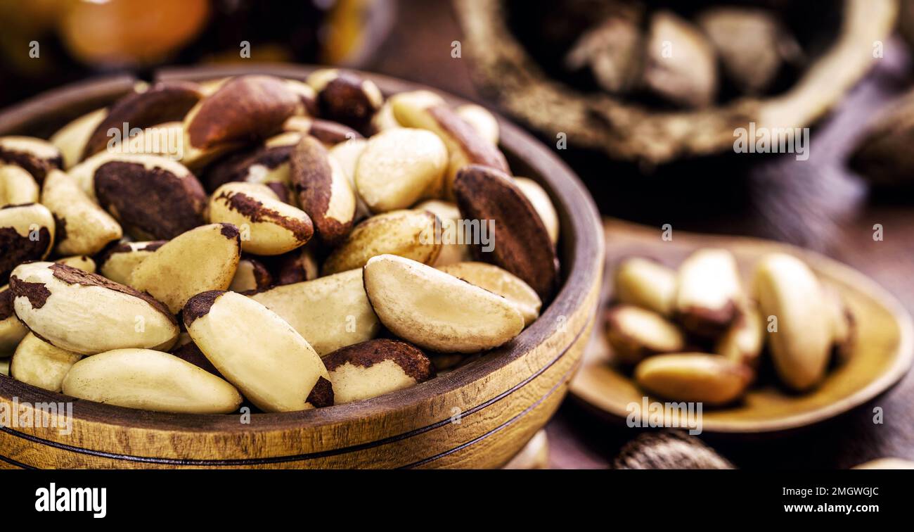 wooden bowl with many Bertholletia excelsa, popularly known as chestnut