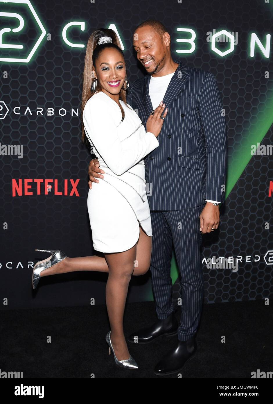 Actors Simone Missick, left, and husband Dorian Missick attend Netflix