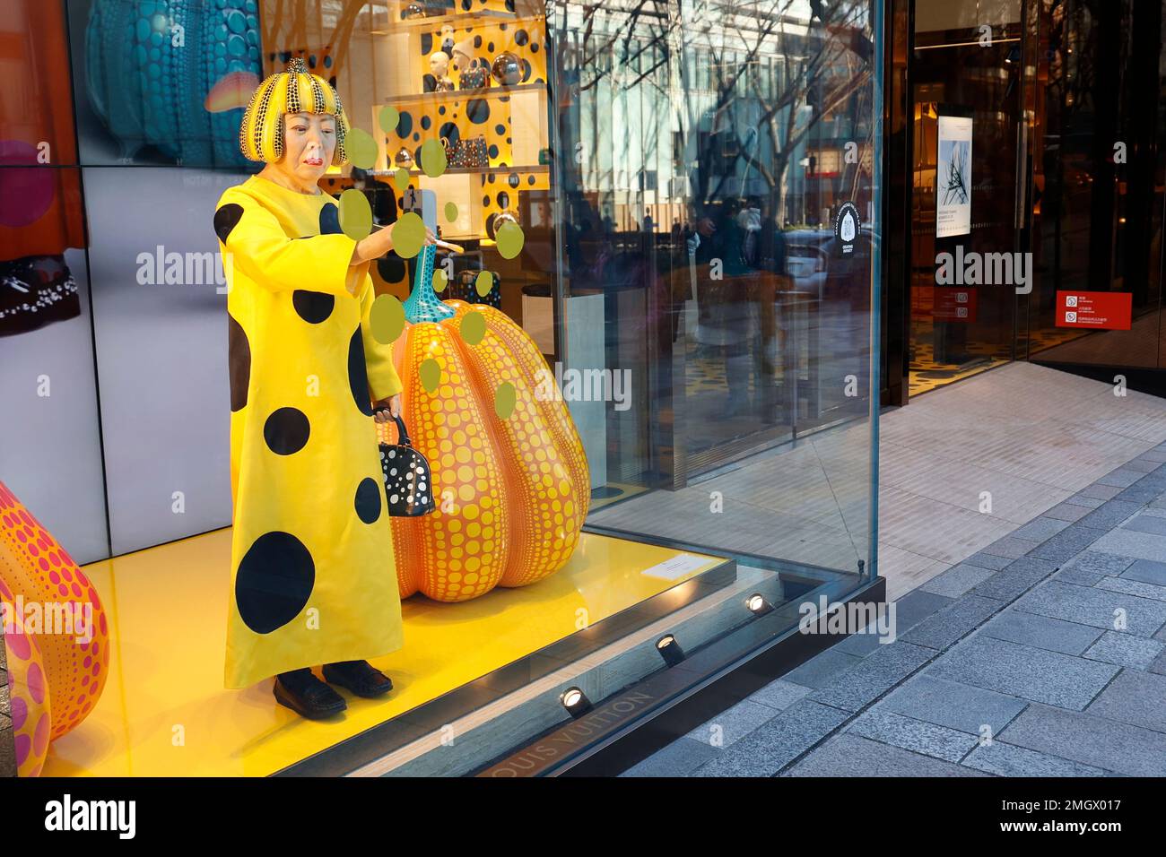 Tokyo, Japan. 26th Jan, 2023. A life-sized humanoid robot of the  contemporary artist Yayoi Kusama is on display at the Louis Vuitton  boutique in the fashion district of Tokyo. The Yayoi Kusama