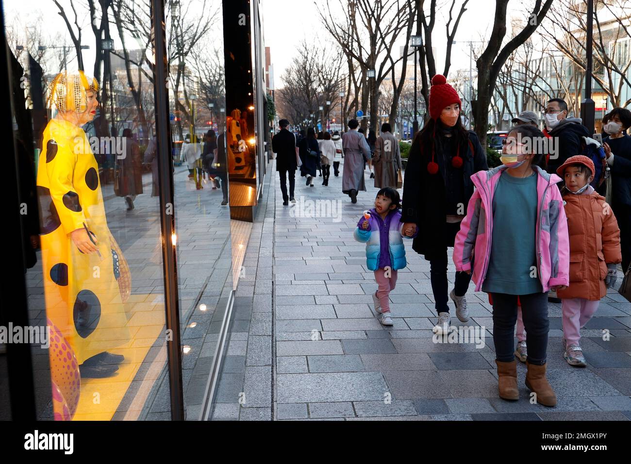 Tokyo, Japan. 26th Jan, 2023. A life-sized humanoid robot of the  contemporary artist Yayoi Kusama is on display at the Louis Vuitton  boutique in the fashion district of Tokyo. The Yayoi Kusama