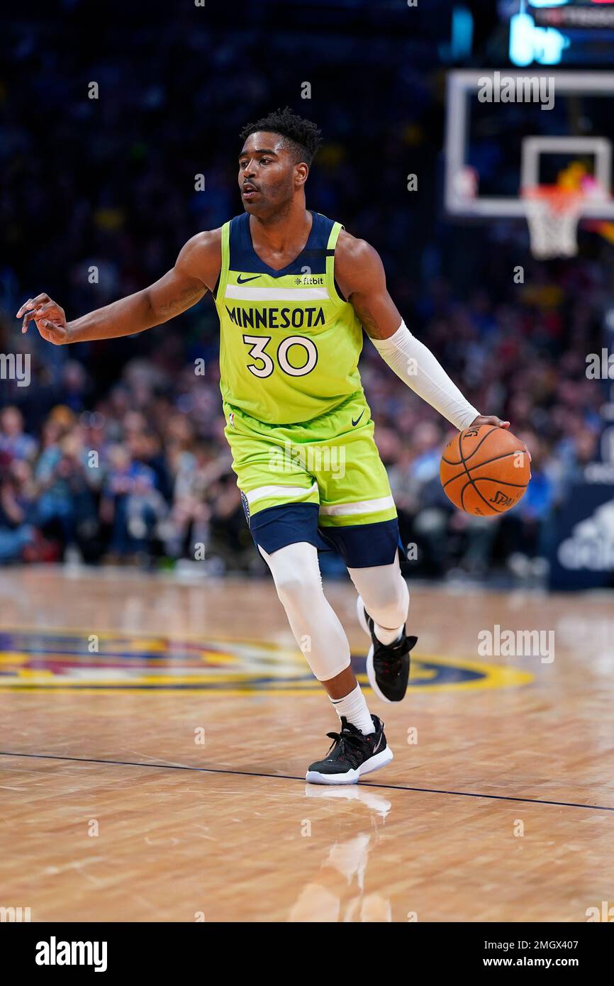 Minnesota Timberwolves forward Kelan Martin plays during an NBA basketball game between the Denver Nuggets and the Minnesota Timberwolves Sunday, Feb. 23, 2020, in Denver. (AP Photo/Jack Dempsey) Stock Photo