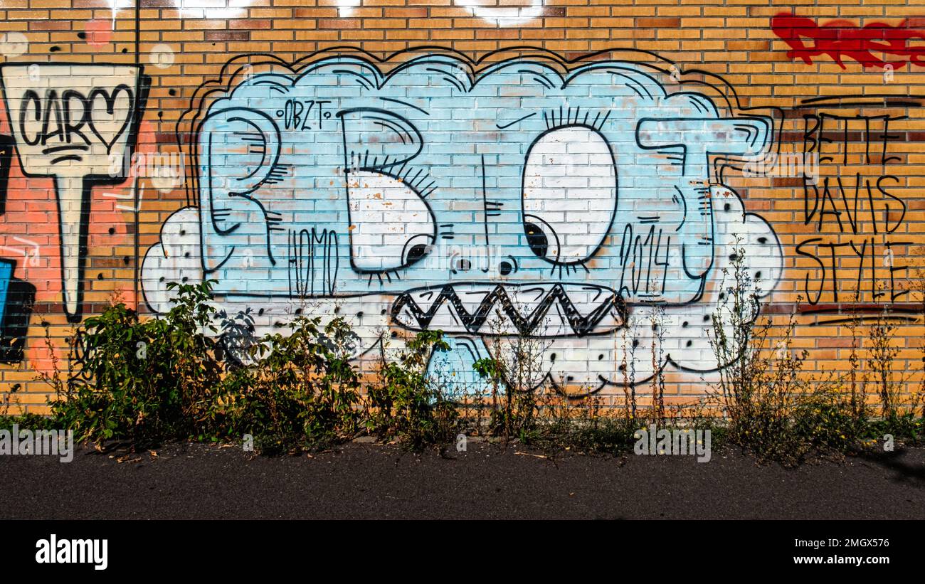 Graffiti covered brick wall of A113 Motorway on Route of former Berlin Wall, Baumschulenweg, Treptow-Köpenick, Berlin Stock Photo