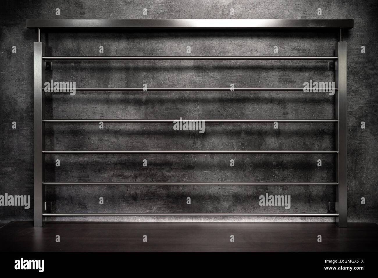 stainless steel railings on a dark background Stock Photo - Alamy