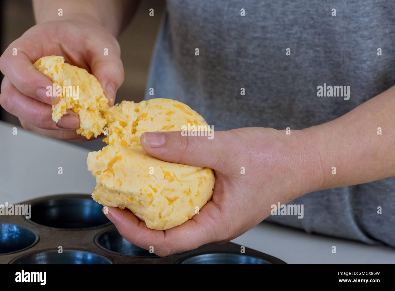 There is traditional Brazilian snack made with cheese buns called chipa, which are traditionally prepared at home then baked. Stock Photo