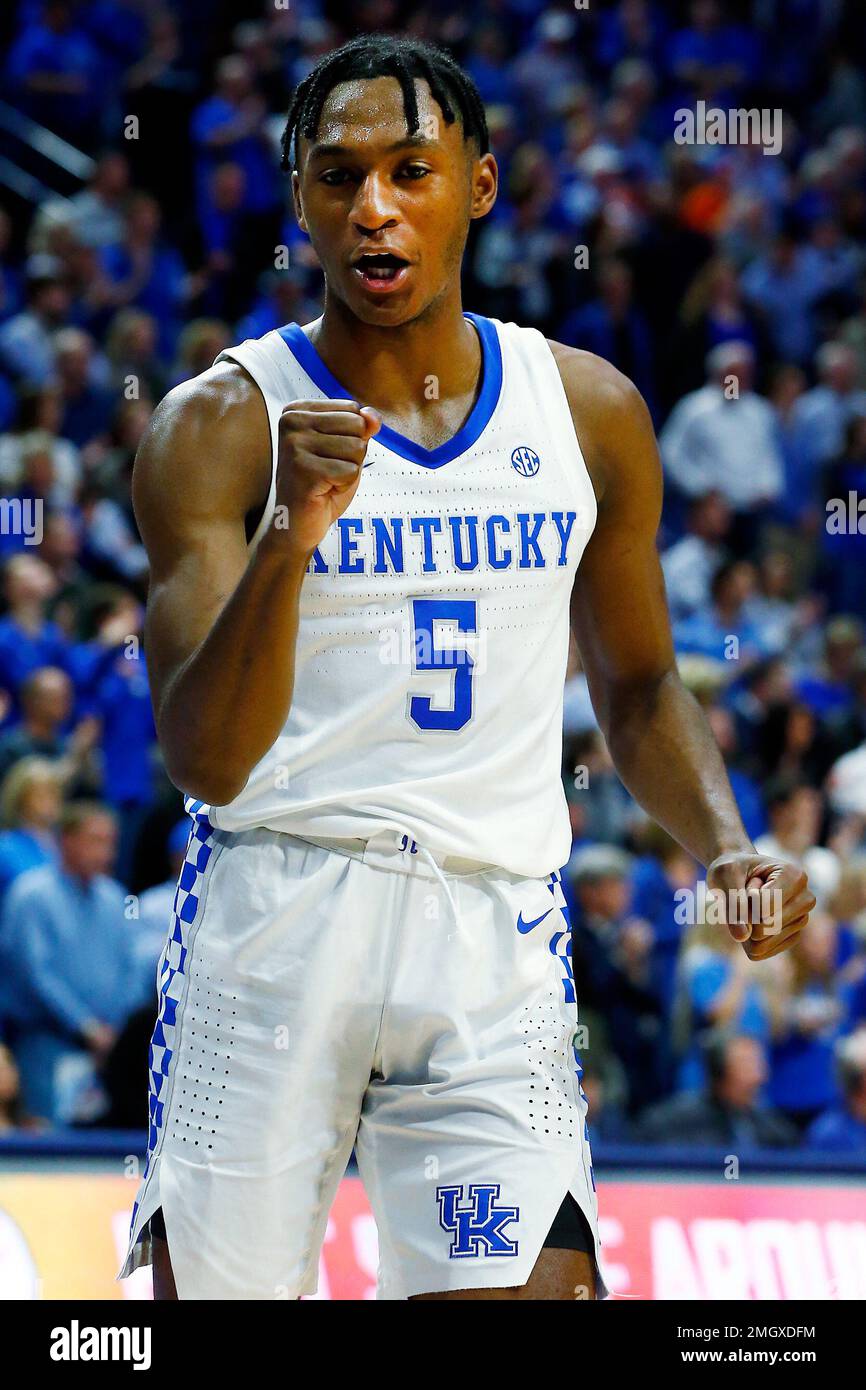 Kentucky's Immanuel Quickley celebrates after defeating Florida 65-59