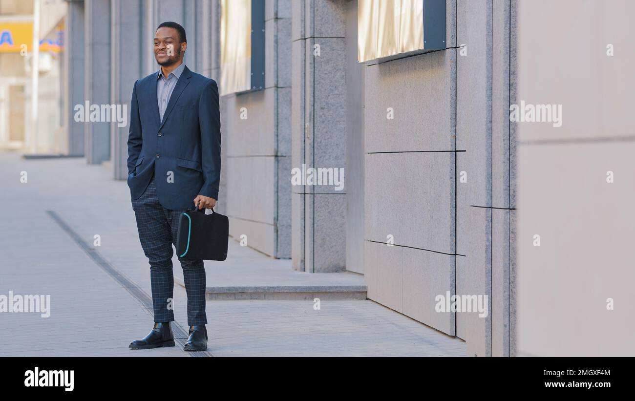 African American man ethnic businessman employer entrepreneur employee boss leader manager investor company CEO male guy in business suit with Stock Photo