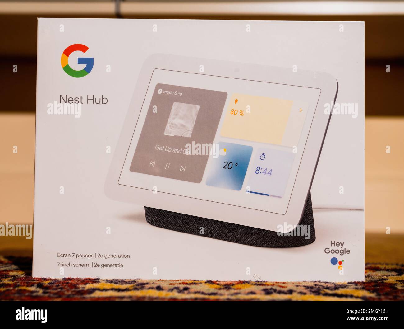 Paris, France - Dec 2, 2022: Close-up of new Google Nest Hub with Hey google service - personal assistant smart speaker - use voice commands with limited touch surface - large display Stock Photo