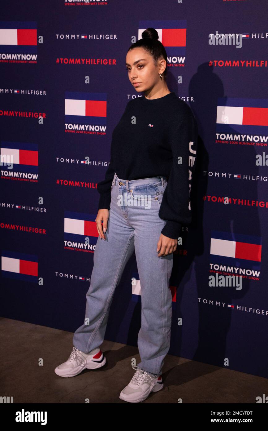 Singer Charli XCX poses for photographers ahead of the Tommy Hilfiger