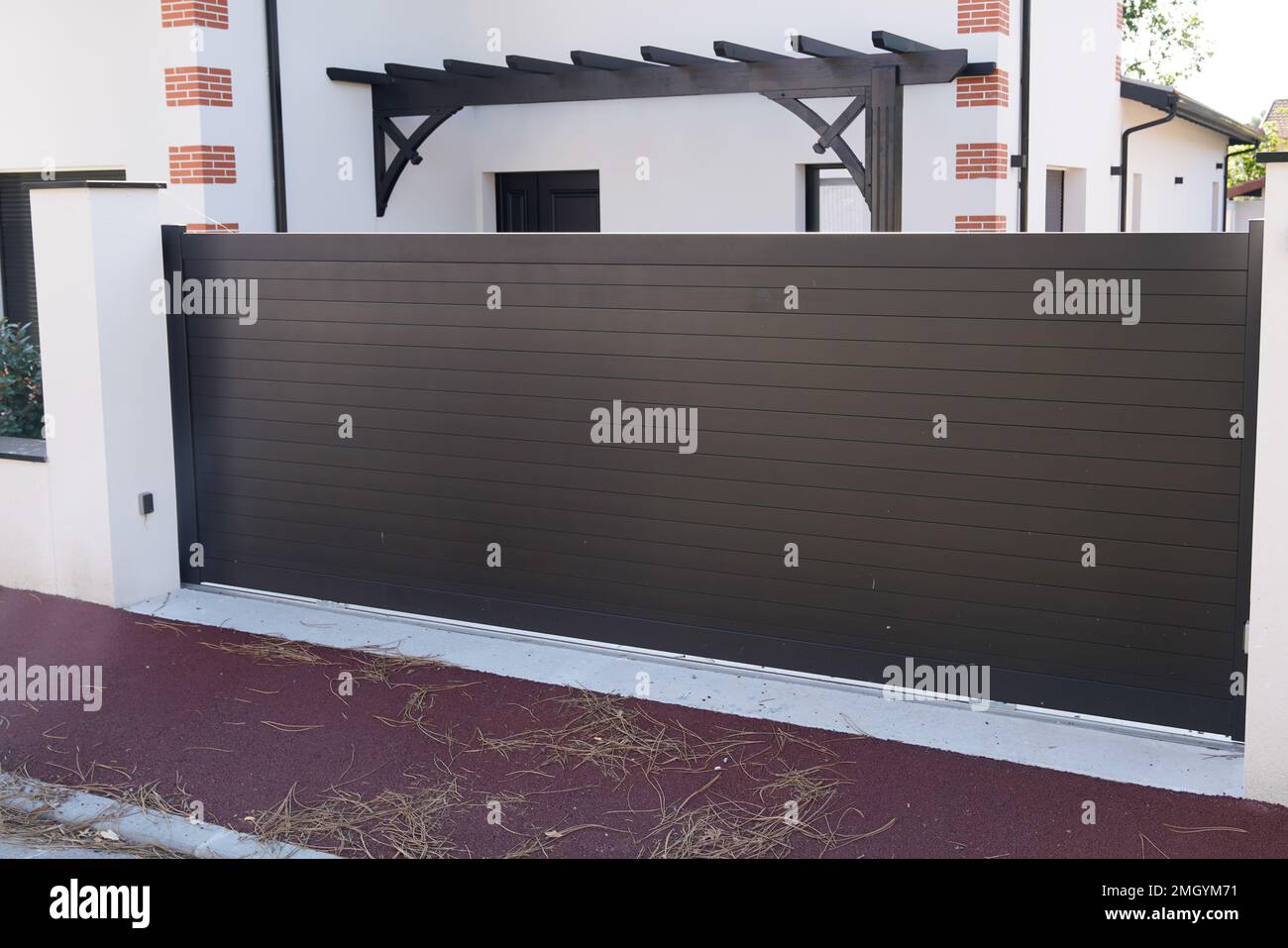 Metal portal sliding dark driveway entrance gates slide house access