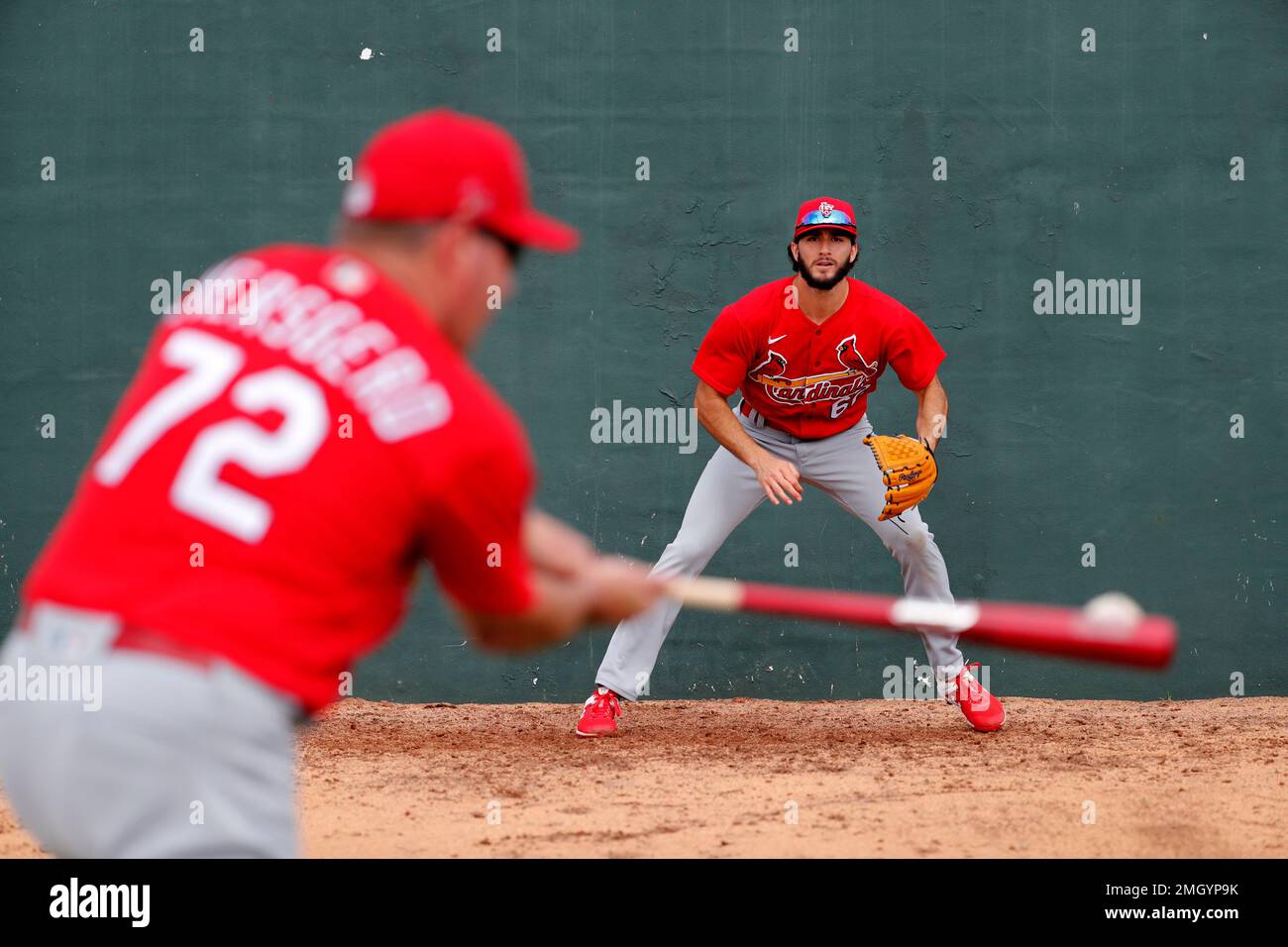 St. Louis Cardinals pitcher Daniel Ponce de Leon takes part in a drill