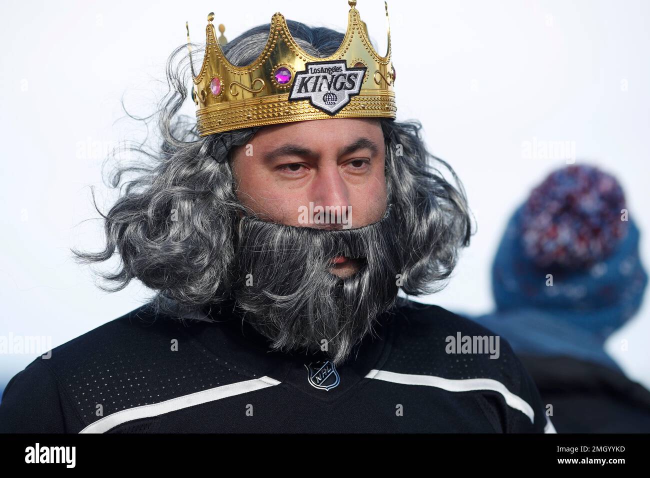 A Los Angeles Kings fan named Carlos, who declined to give his surname,  wears a crown as he heads into Falcon Stadium for an NHL Stadium Series  outdoor hockey game between the