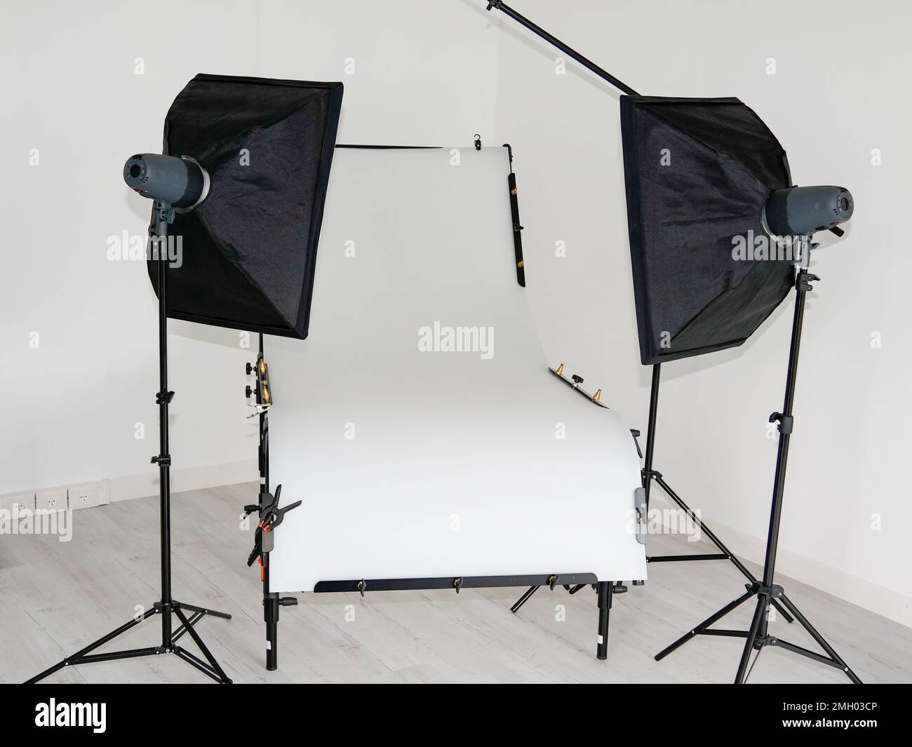 modern photo studio setup with lights table professional equipment