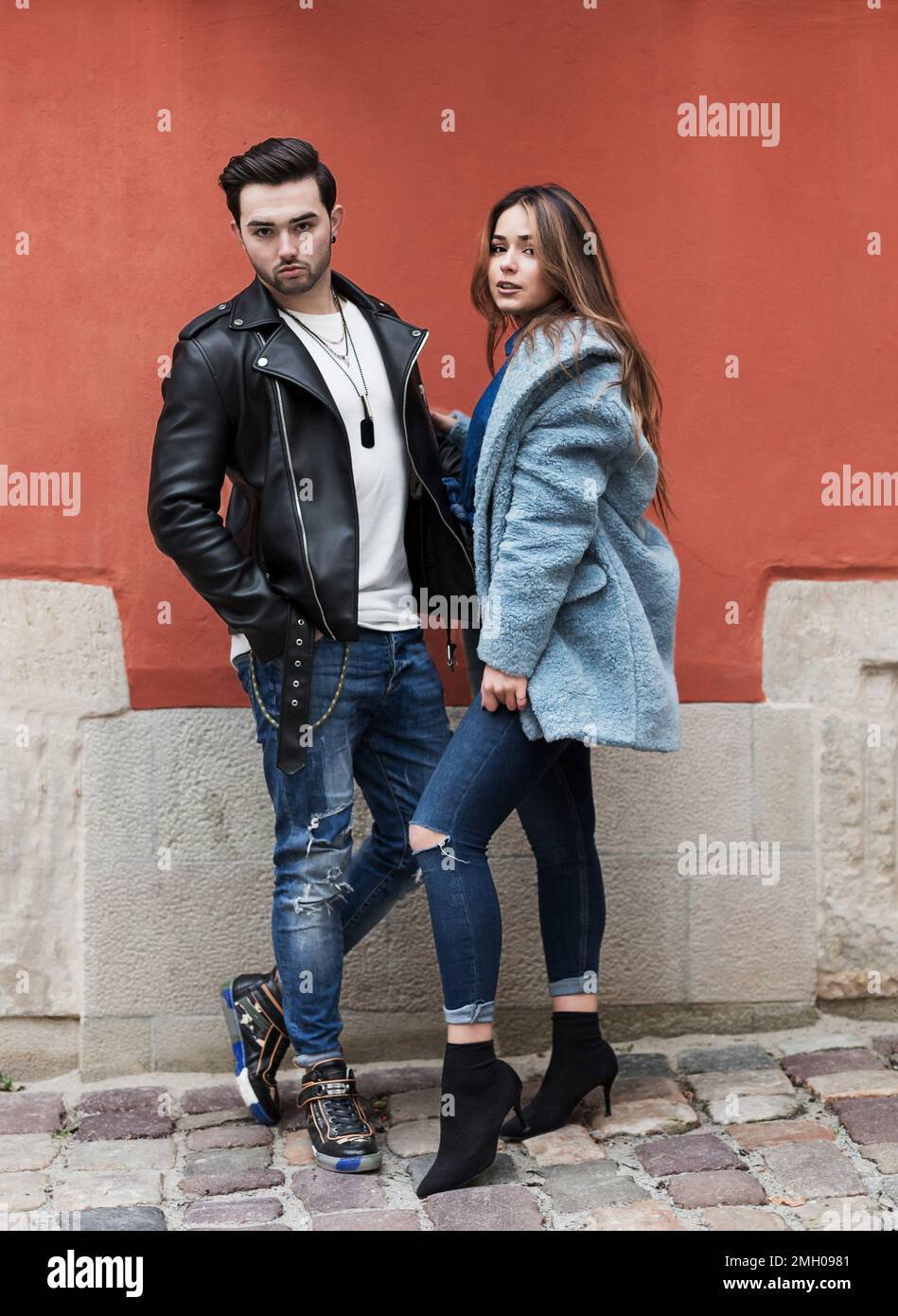 stylish happy couple enjoying a date on the street of a European city Stock Photo