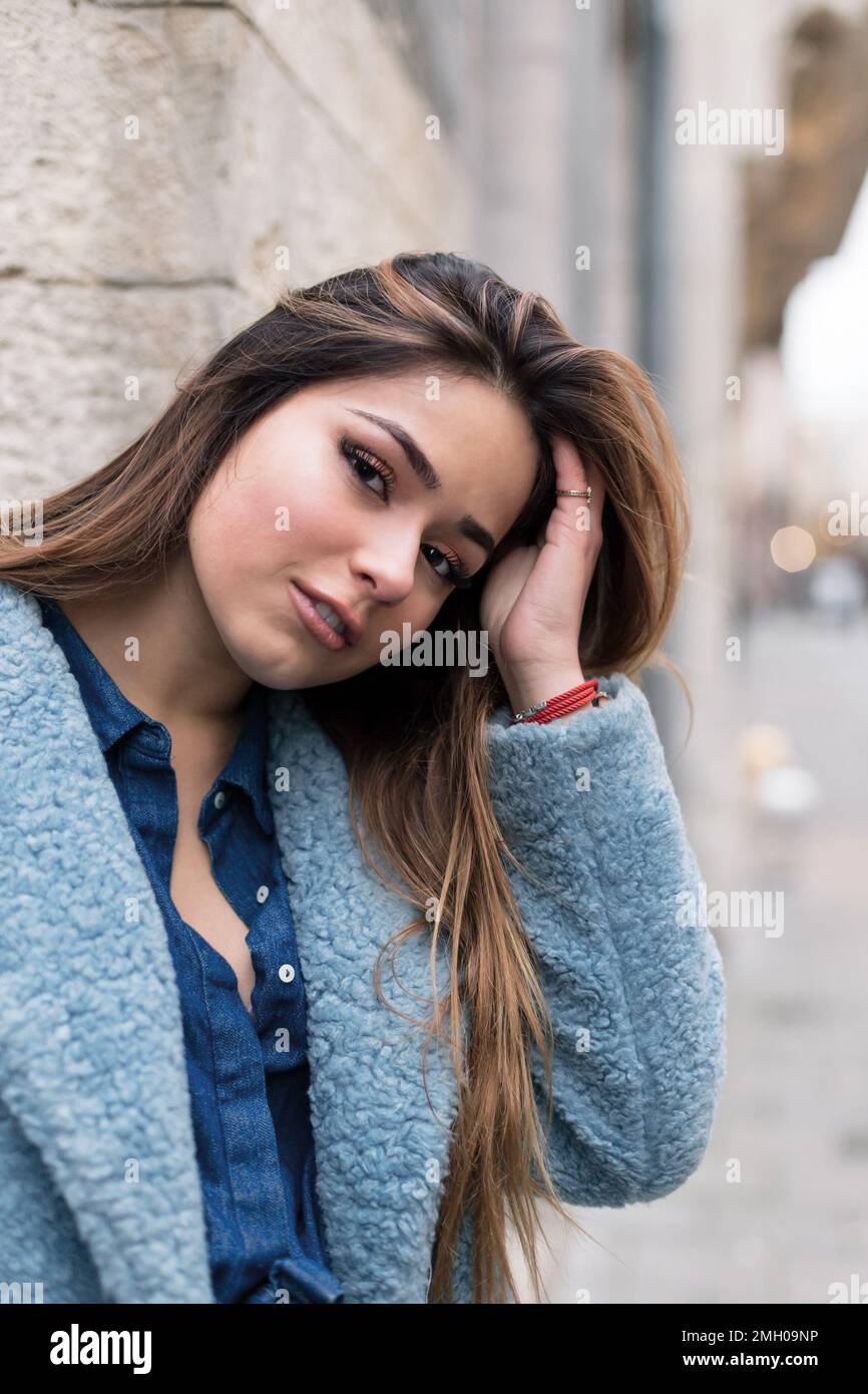 Young stylish woman in a blue fur coat Stock Photo