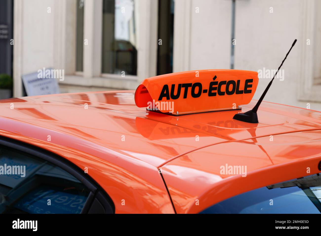 auto ecole text in french of driving school panel on the car roof Stock Photo