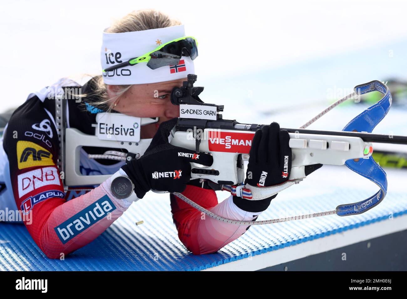 Tiril Eckhoff of Norway aims her rifle during warm before the start of ...