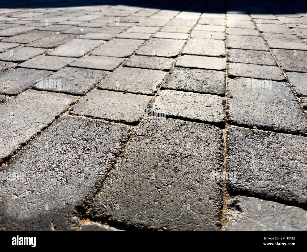 Block paved drive in charcoal grey colour paving Stock Photo