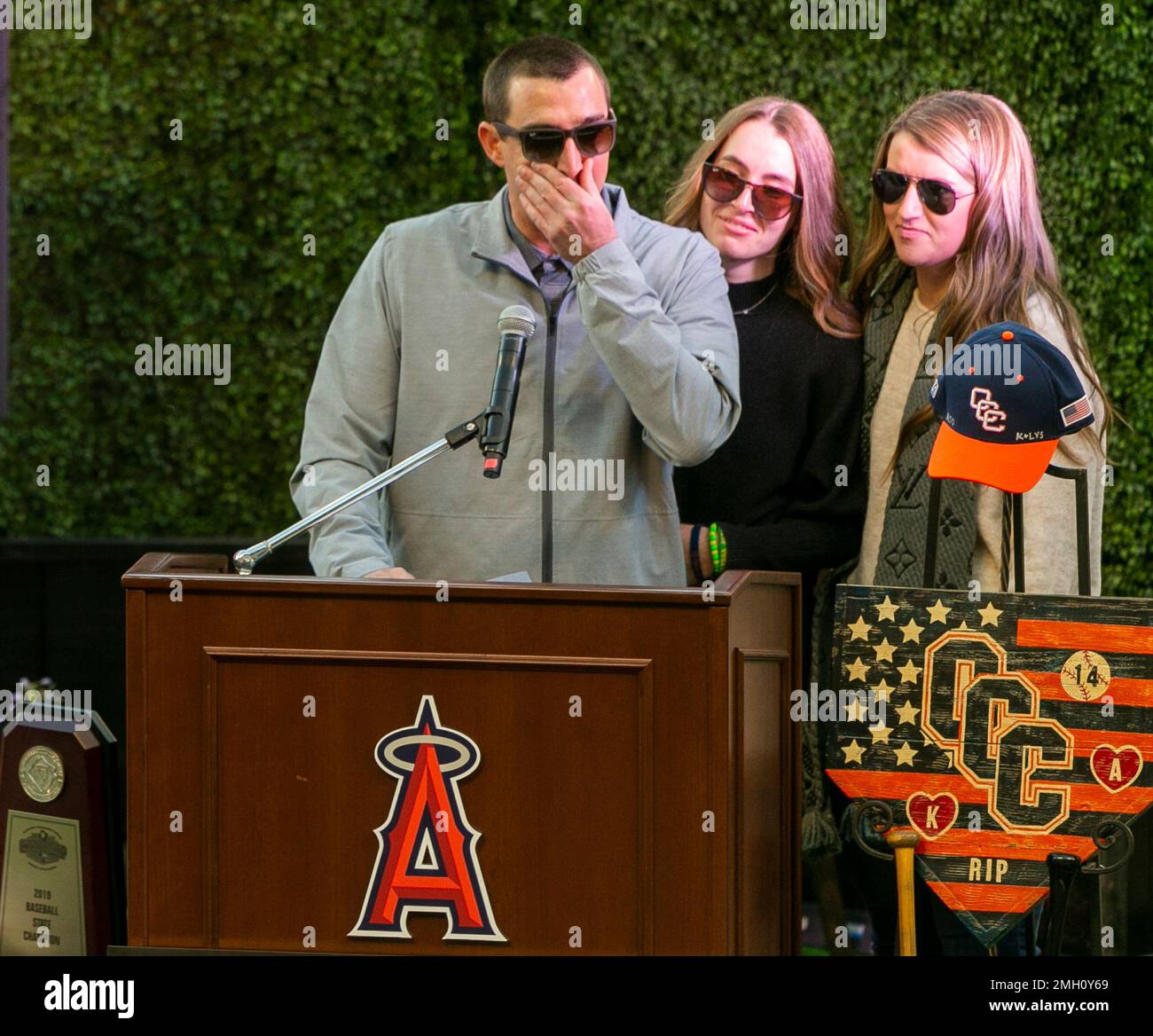 Family members of coach John Altobelli, his son J.J. Altobelli, left