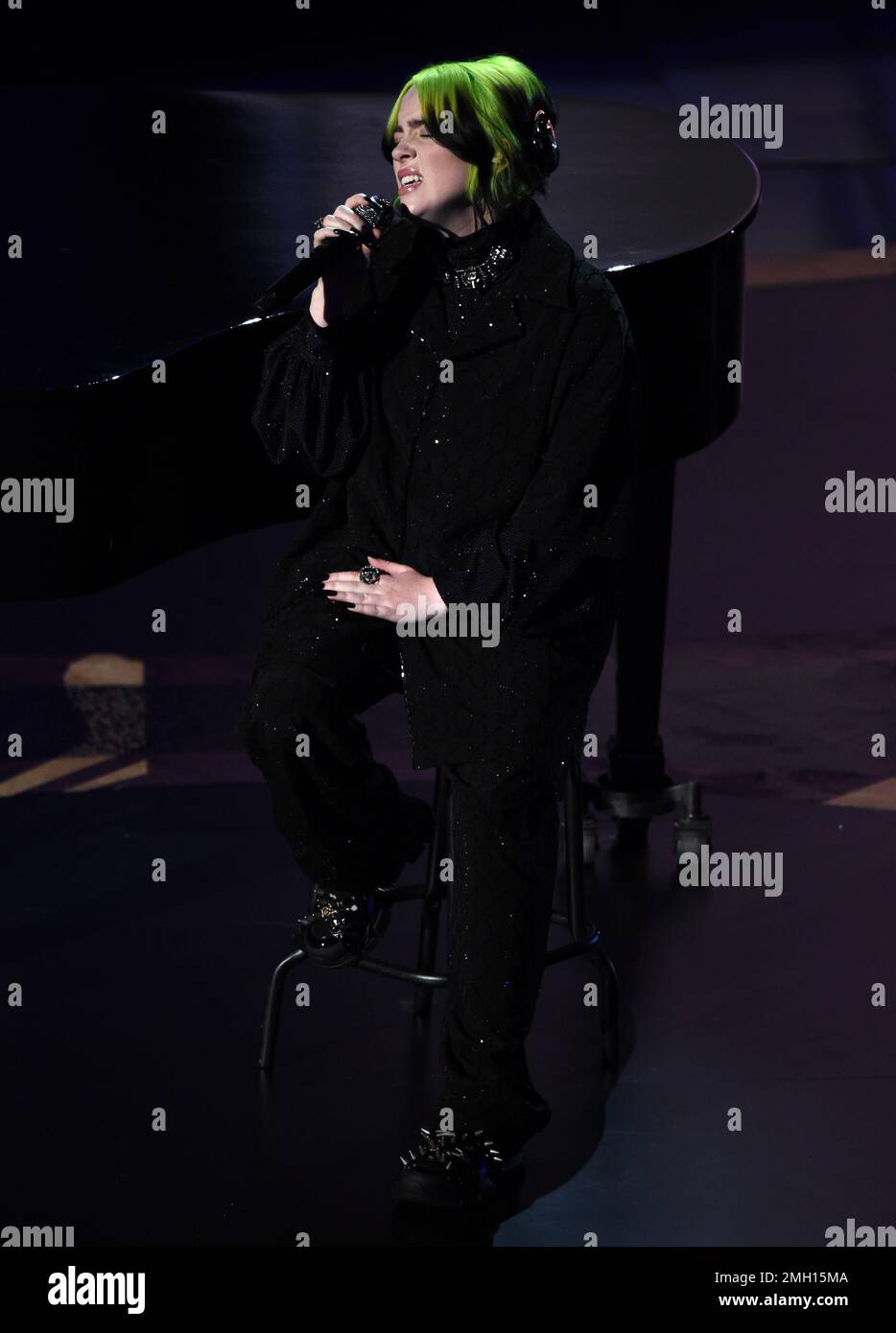 Billie Eilish performs during the in memoriam tribute at the Oscars on