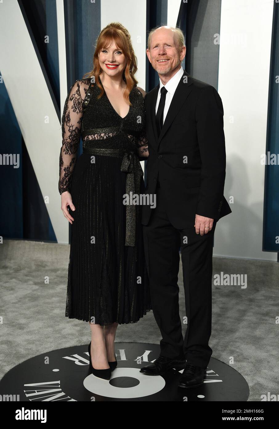Bryce Dallas Howard, left, and Ron Howard arrive at the Vanity Fair(02)