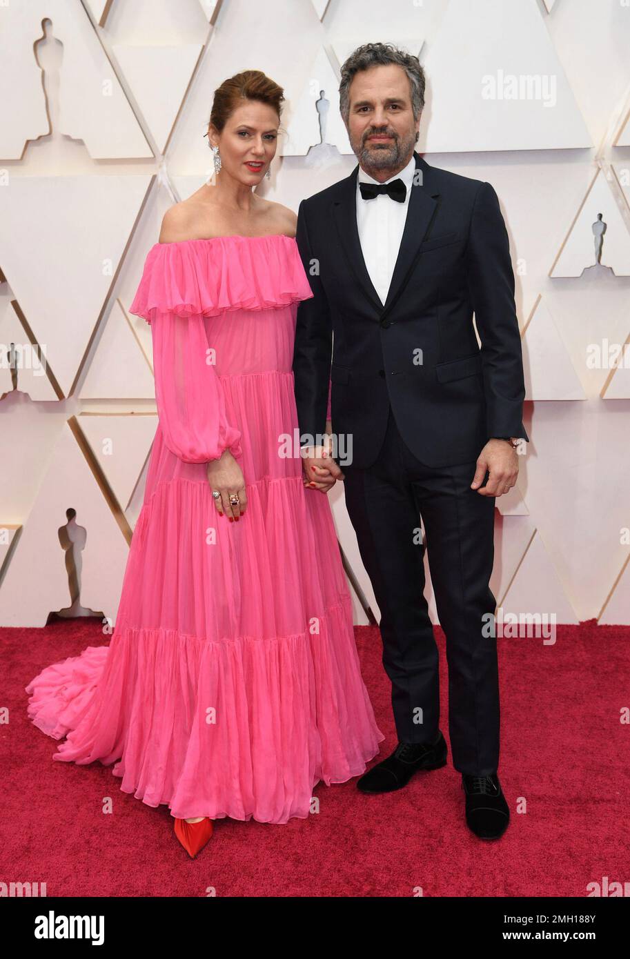 Sunrise Coigney, left, and Mark Ruffalo arrive at the Oscars on Sunday(02)