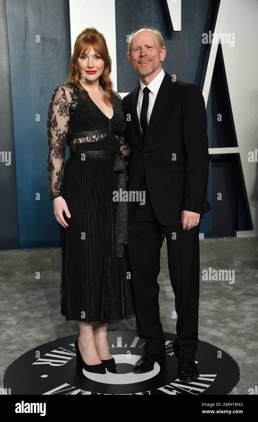 Bryce Dallas Howard Left And Ron Howard Arrive At The Vanity Fair bryce-dallas-howard-left-and-ron-howard-arrive-at-the-vanity-fair