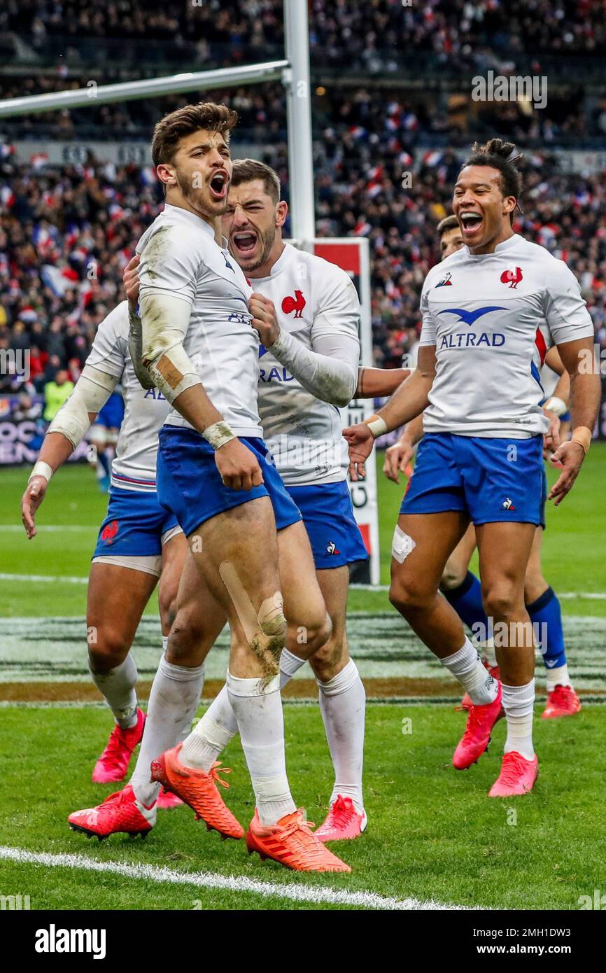 France rugby player Romain Ntamack, left, celebrates after scoring a try  during the Six Nations international rugby union match against Italy at the  Stade de France stadium, in Saint Denis, north of