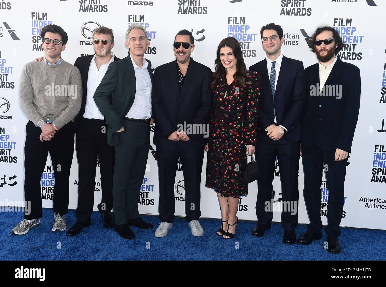 Eli Bush, from left, Sebastian Bear-McClard, Ronald Bronstein, Adam Sandler, Idina Menzel, Benny Safdie and Josh Safdie arrive at the 35th Film Independent Spirit Awards on Saturday, Feb. 8, 2020, in Santa Monica, Calif. (Photo by Jordan Strauss/Invision/AP) Stock Photo